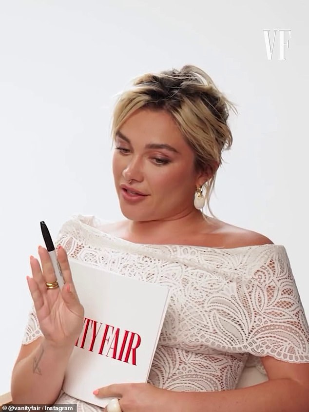 أجابت مرتديةً فستانًا أبيضًا مكشوفًا من الكتفين: 