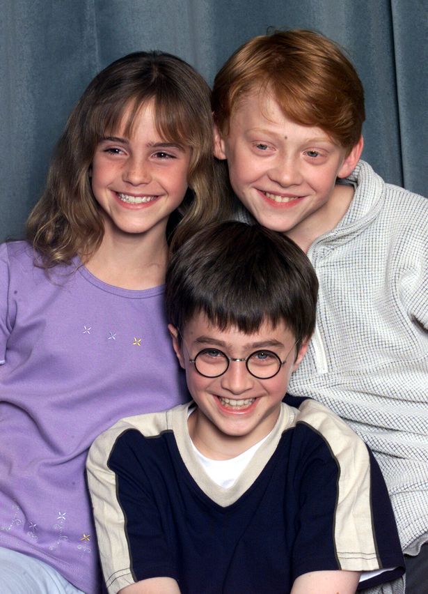الممثلون إيما واتسون (L) ودانييل رادكليف (C) و Rupert Grint (R)