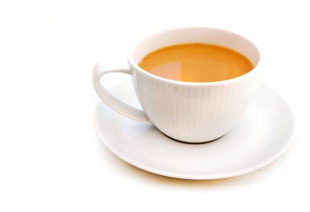 كوب مزدهر الأبيض وصحن.