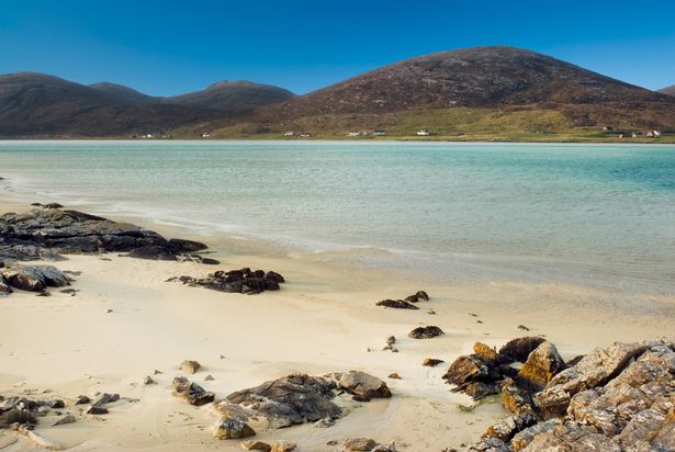 الشاطئ في Luskentyre ، يتطلع نحو SeileBost ، Sound of Taransay ، Isle of Harris ، Outer Hebrides ، اسكتلندا