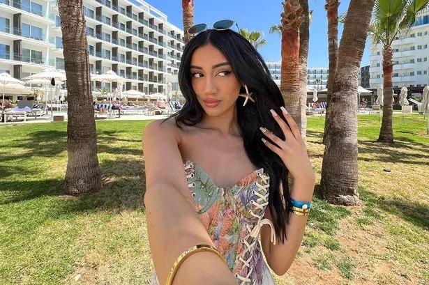 تام