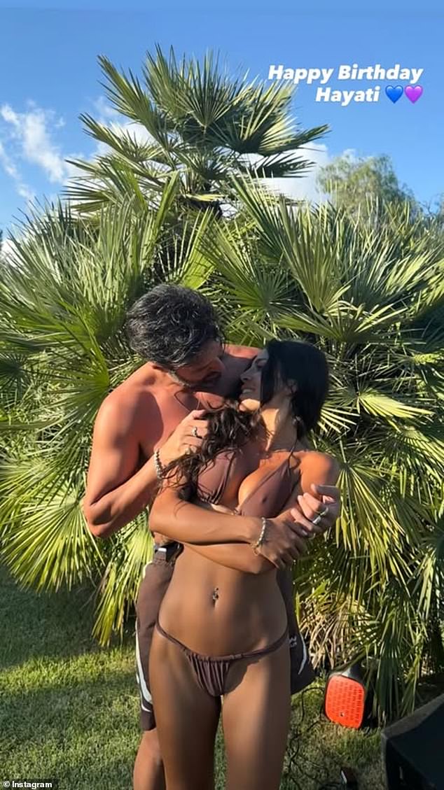قام Andy بتحميل هذه الصورة للزوجين المقفلة في احتضان حميم لعيد ميلاد Raquelle