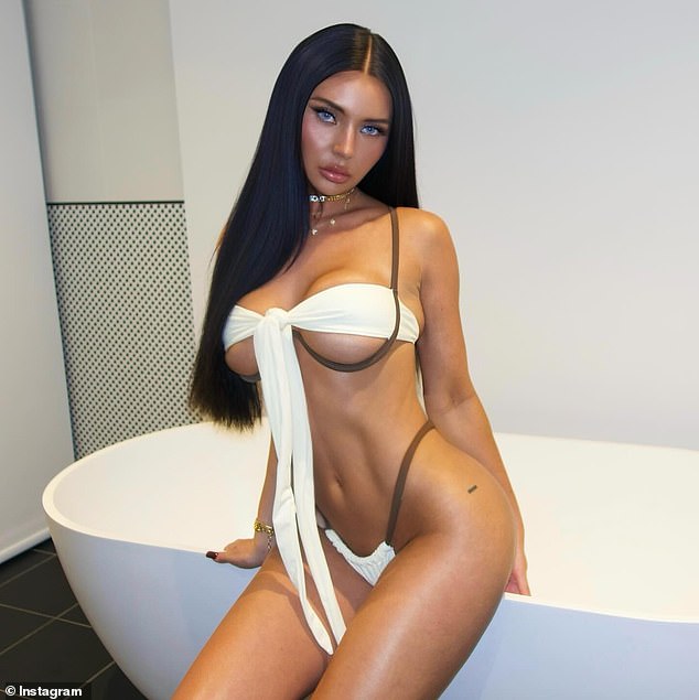 الرياضية تان غنيًا من الماهوغوني ، كشفت المحامية عن لمحة سخية من Underboob لأنها ممتدة بشكل مؤكد للكاميرا